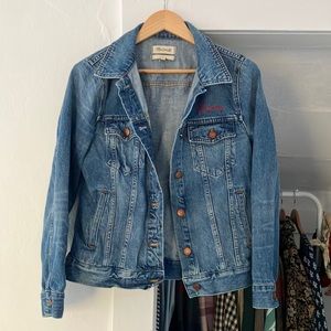Madewell classic denim jacket. Embroidered in red thread says “mama”